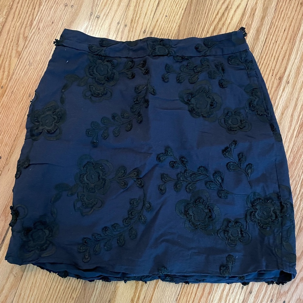 Banana Republic mini skirt. Blue with black embroidered flowers.